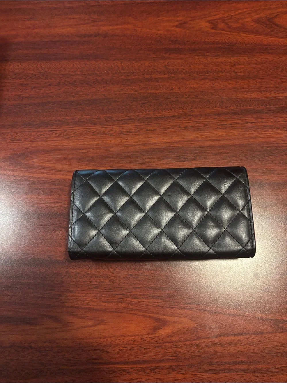CHANEL Black Quilted Leather Wallet with Red Trim